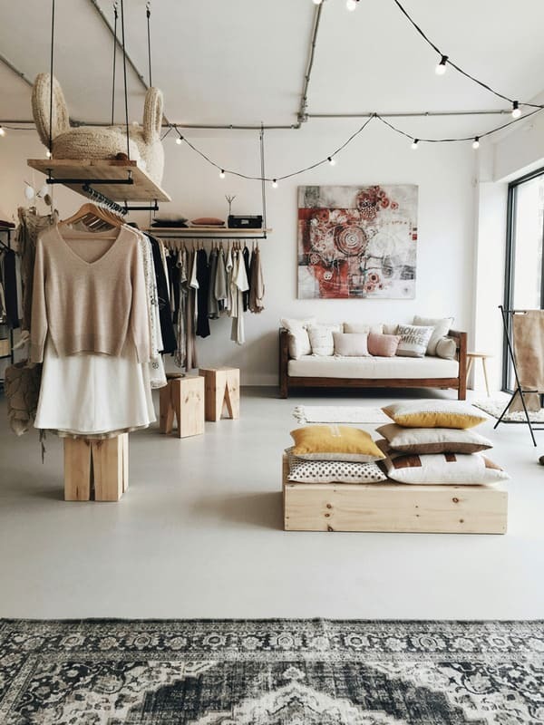Open studio apartment with separate living sleeping and storage zones