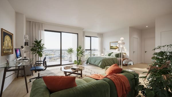 Studio apartment layout showing bed sofa and desk arranged along one open room